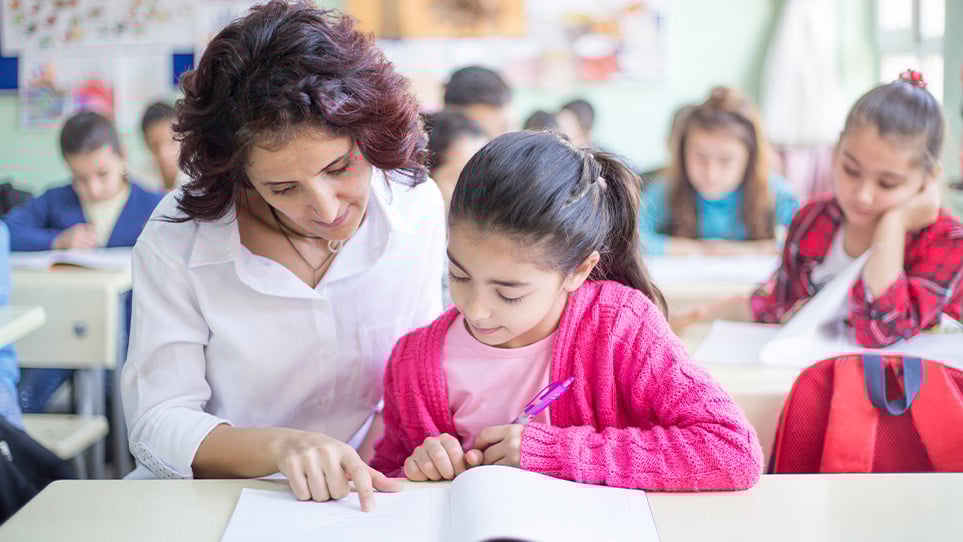 teacher-helping-student